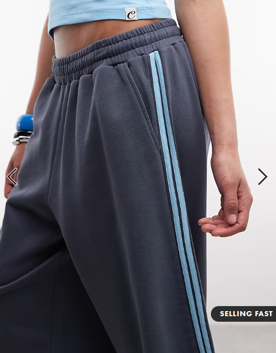 COLLUSION sporty striped baggy longline jersey shorts in navy