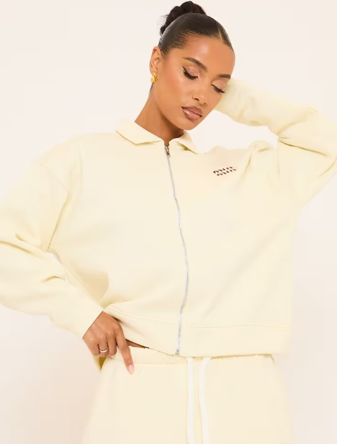 Sleeveless Button Up Top In Cream Rib