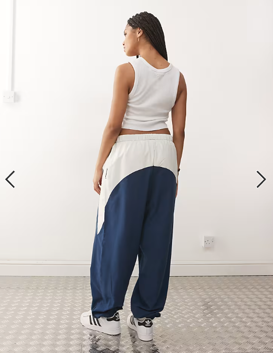 COLLUSION Unisex nylon panelled tracksuit co-ord in blue