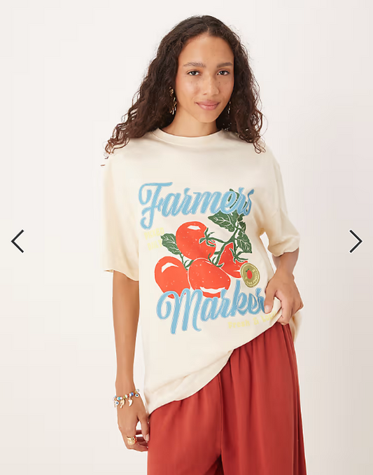 ASOS DESIGN oversized t-shirt with farmer tomato graphic in cream