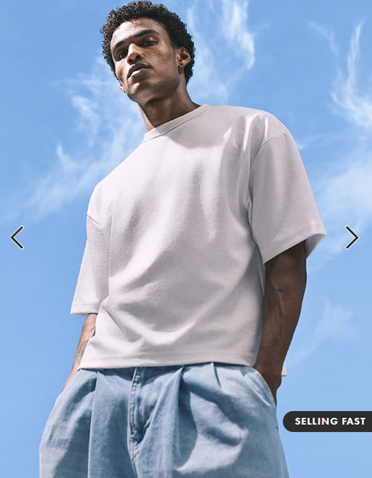 ASOS DESIGN breatheMAX™ heavyweight boxy oversized t-shirt in white cotton blend .