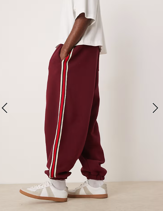 ASOS DESIGN baggy balloon jogger with taping in burgundy