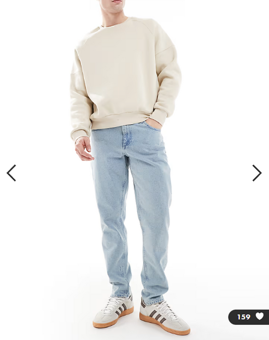 ASOS DESIGN tapered jeans in light stone wash blue