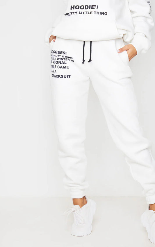 LOGO CREAM SLOGAN PRINTED JOGGERS