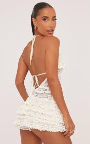 Ego - halterneck cross strap all over frill detail playsuit in cream