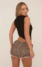 Ego - High Neck Sleeveless Asymmetric Crop Top In Black Mesh