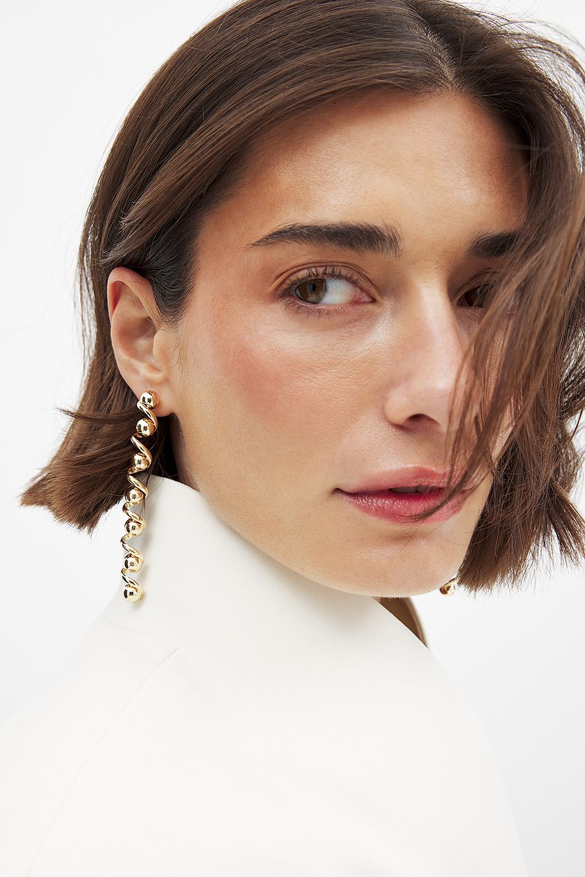 Na-kd Long Swirl Earrings