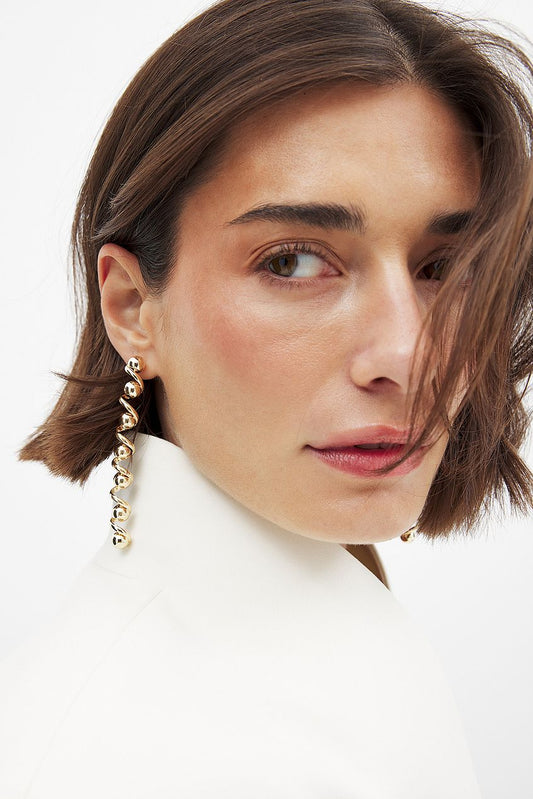 Na-kd Long Swirl Earrings