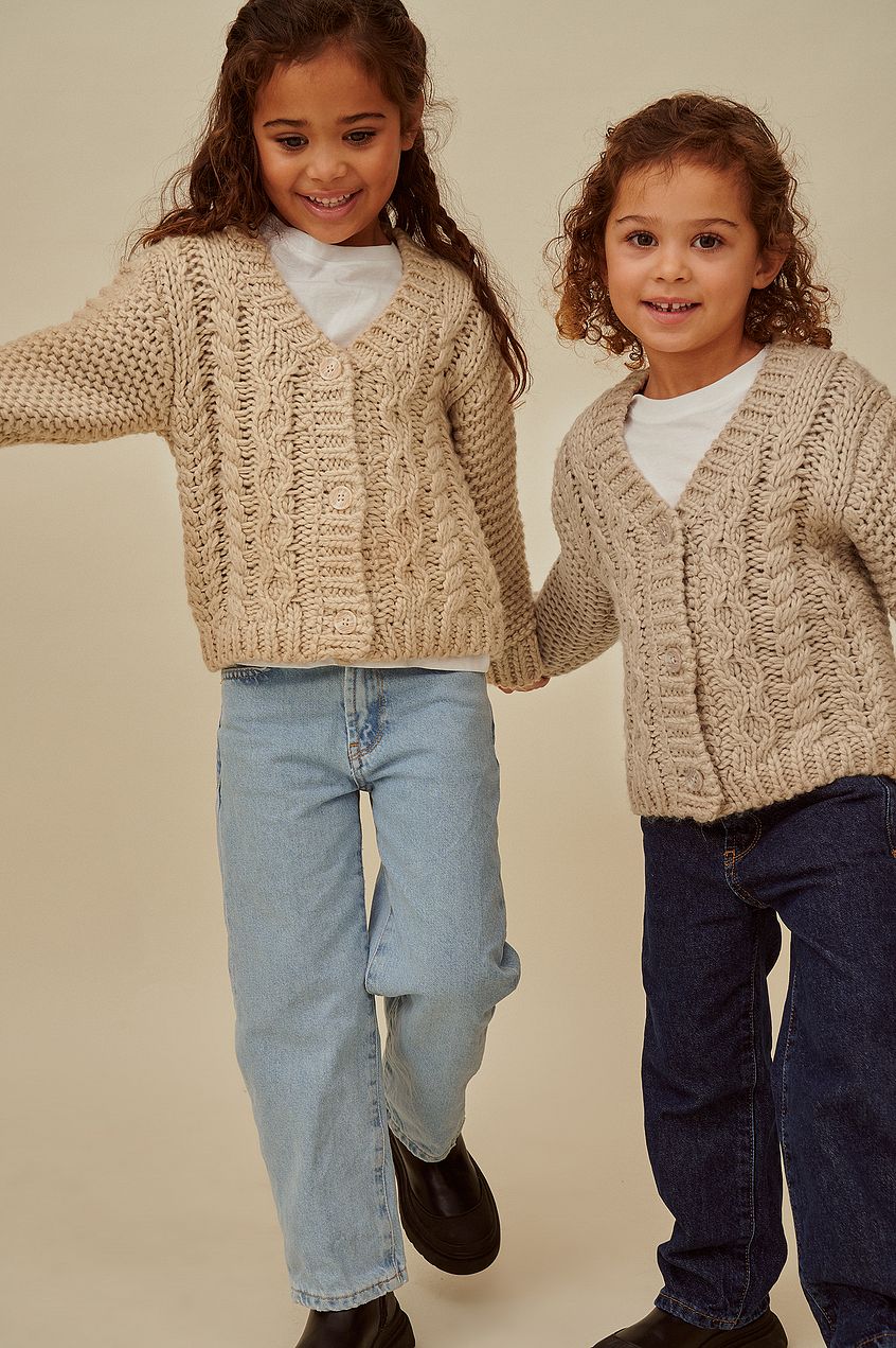 Cable knitted mini cardigan