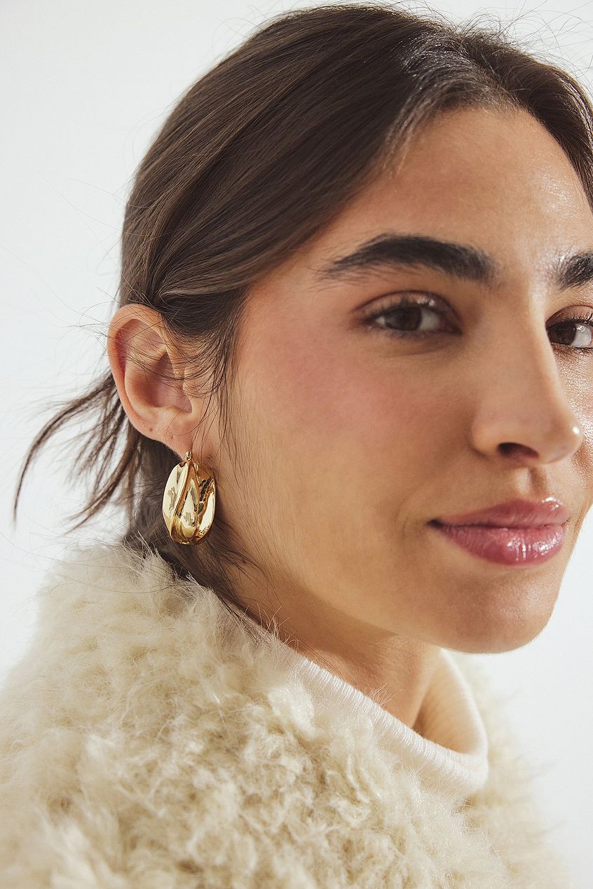 Na-kd Twisted Hoop Earrings