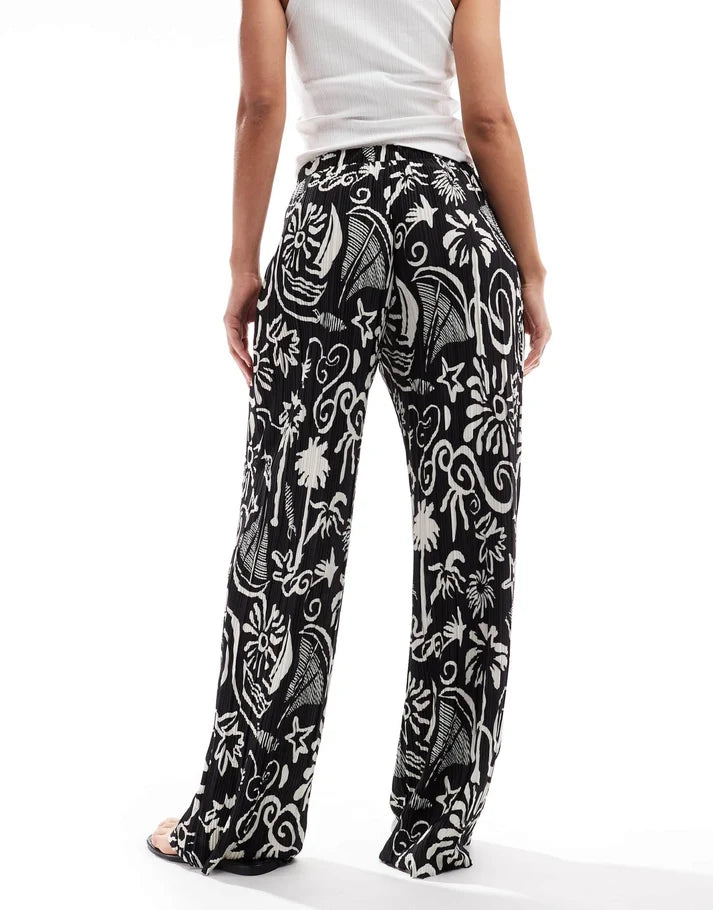Vero Moda high waist wide leg plisse trouser in tropical conversational print